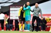 Arsenal's goalkeeper Bernd Leno (1) talks with Watford's Ismaila Sarr hug each other after the English Premier League soccer match between Arsenal and Watford at Emirates Stadium in London, England, Sunday, July 26, 2020. (AP photo/ Rui Vieira, Pool)