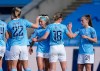Manchester City's Chloe Kelly, center left, celebrates scoring her sides first goal in the Women's Super League soccer match between Manchester City Women and Tottenham Hotspur Women at the Academy Stadium, Manchester, England, Sunday Oct. 4, 2020. (AP Photo/Dave Thompson)