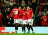 Manchester United's Ashley Young, 18, celebrates scoring his side's first goal of the game during the Europa League group L soccer match between Manchester United and AZ Alkmaar at Old Trafford in Manchester, England, Thursday, Dec. 12, 2019. (AP Photo/Dave Thompson)