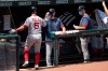 Boston Red Sox' Kevin Pillar (5) celebrates with teammates after hitting a solo home run during the first inning of a baseball game against the Baltimore Orioles, Sunday, Aug. 23, 2020, in Baltimore. (AP Photo/Tommy Gilligan)
