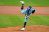 Toronto Blue Jays starting pitcher Nate Pearson (24) delivers a pitch during the first inning of a baseball game against the Baltimore Orioles , Tuesday, Aug. 18, 2020, in Baltimore. (AP Photo/Tommy Gilligan)
