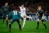 Lille's Yusuf Yazici, 2nd right, kicks the ball while Ajax's Noussair Mazraoui, left, Ajax's Nicolas Tagliafico, 2nd left, and Ajax's Perr Schuurs looks on during the group H Champions League soccer match between LOSC Lille and Ajax at the Stade Pierre Mauroy - Villeneuve d'Ascq stadium in Lille, France, Wednesday, Nov. 27, 2019. (AP Photo/Michel Spingler)