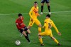 Osasuna's Nacho Vidal, left, in action next to Barcelona's Pedri, right, during the Spanish La Liga soccer match between Osasuna and FC Barcelona at El Sadar stadium in Pamplona, Spain, Saturday, March 6, 2021. (AP Photo/Alvaro Barrientos)