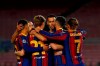 Barcelona's Lionel Messi celebrates with teammates after scoring from a penalty kick during the Champions League group G soccer match between FC Barcelona and Dynamo Kyiv at the Camp Nou stadium in Barcelona, Spain, Wednesday, Nov. 4, 2020. (AP Photo/Joan Monfort)
