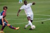 Real Madrid's Ferland Mendy, right, kicks the ball during the Spanish La Liga soccer match between Levante and Real Madrid at the Ceramica stadium in Villarreal, Spain, Sunday, Oct. 4, 2020. (AP Photo/Jose Miguel Fernandez)