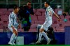 Juventus' Cristiano Ronaldo, left, celebrates after scoring his side's first goal during the Champions League group G soccer match between FC Barcelona and Juventus at the Camp Nou stadium in Barcelona, Spain, Tuesday, Dec. 8, 2020. (AP Photo/Joan Monfort)