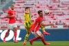Benfica's player Andre Almeida, right, vies for the ball with Tondela's Yohan Tavares during a Portuguese League soccer match between Benfica and Tondela in Lisbon, Portugal, Thursday, June 4, 2020. The Portuguese League soccer matches resumed Wednesday without spectators because of the coronavirus pandemic. (Tiago Petinga/Pool via AP)