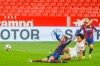 Sevilla's Jules Kounde, second right, kicks the ball to score his side's first goal during a Spanish Copa del Rey semifinal soccer match between Sevilla and FC Barcelona at Ramon Sanchez Pizjuan stadium in Seville , Spain, Wednesday, Feb. 10, 2021. (AP Photo/Angel Fernandez)