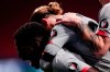 Athletic Bilbao's Iker Muniain, right, celebrates after scoring his side's first goal with his teammate Inaki Williams, left, during the Spanish La Liga soccer match between Atletico Madrid and Athletic Bilbao at Wanda Metropolitano stadium in Madrid, Spain, Wednesday, March 10, 2021. (AP Photo/Bernat Armangue)