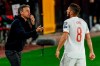 Spain's head coach Luis Enrique, left, talks with Spain's Jorge Koke during a World Cup 2022 group B qualifying soccer match between Spain and Greece at the Los Carmenes stadium in Granada, Spain, Thursday, March 25, 2021. (AP Photo/Fermin Rodriguez)