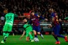 Barcelona's Lionel Messi vies for the ball with Leganes' Dimitris Siovas during a Spanish Copa del Rey soccer match between Barcelona and Leganes at the Camp Nou stadium in Barcelona, Spain, Thursday, Jan. 30, 2020. (AP Photo/Joan Monfort)