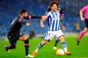 Real Sociedad's David Silva, right, vies for the ball with Napoli's Elseid Hysaj during the Europa League group F soccer match between Real Sociedad and Napoli at the Anoeta stadium in San Sebastian, Spain, Thursday, Oct. 29, 2020. (AP Photo/Amaia Zabalo)