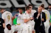 Real Madrid's head coach Zinedine Zidane, right, talks with Real Madrid's Gareth Bale during the Spanish La Liga soccer match between Real Madrid and Mallorca at Alfredo di Stefano stadium in Madrid, Spain, Wednesday, June 24, 2020. (AP Photo/Bernat Armangue)