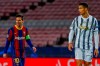 Barcelona's Lionel Messi, left, and Juventus' Cristiano Ronaldo during the Champions League group G soccer match between FC Barcelona and Juventus at the Camp Nou stadium in Barcelona, Spain, Tuesday, Dec. 8, 2020. (AP Photo/Joan Monfort)