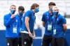 Atalanta players stand on the pitch during a team walk around at the Luz stadium in Lisbon, Tuesday Aug. 11, 2020. Atalanta will play PSG in a Champions League quarterfinals soccer match on Wednesday. (David Ramos/Pool via AP)