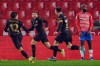 Barcelona's Jordi Alba celebrates after scoring his side's fifth goal during a Spanish Copa del Rey quarter finals soccer match between Granada and FC Barcelona at the Los Carmenes stadium in Granada, Spain, Wednesday, Feb. 3, 2021. (AP Photo)
