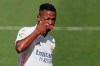 Real Madrid's Vinicius Junior celebrates after scoring the opening goal during the Spanish La Liga soccer match between Levante and Real Madrid at the Ceramica stadium in Villarreal, Spain, Sunday, Oct. 4, 2020. (AP Photo/Jose Miguel Fernandez)