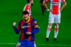 Barcelona's Lionel Messi celebrates after scoring his side's second goal during the Spanish La Liga soccer match between FC Barcelona and Alaves at the Camp Nou stadium in Barcelona, Spain, Saturday, Feb. 13, 2021. (AP Photo/Joan Monfort)
