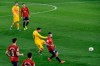 Barcelona's Lionel Messi, center, tries a shot during the Spanish La Liga soccer match between Osasuna and FC Barcelona at El Sadar stadium in Pamplona, Spain, Saturday, March 6, 2021. (AP Photo/Alvaro Barrientos)