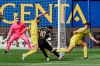 Barcelona's Lionel Messi tries to score during the Spanish La Liga soccer match between Villarreal and FC Barcelona at the Ceramica stadium in Villarreal, Spain, Sunday, April 25, 2021. (AP Photo/Alberto Saiz)