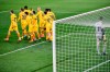 Barcelona's Moriba Kourouma Kourouma celebrates with his teammates after scoring his side's second goal during the Spanish La Liga soccer match between Osasuna and FC Barcelona at El Sadar stadium in Pamplona, Spain, Saturday, March 6, 2021. (AP Photo/Alvaro Barrientos)