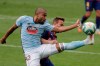 Celta Vigo's Rafinha, left, vies for the ball with Barcelona's Arthur during a Spanish La Liga soccer match between RC Celta and Barcelona at the Balaidos stadium in Vigo, Spain, Saturday, June 27, 2020. (AP Photo/Lalo Villar)