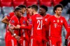 Bayern's Eric Maxim Choupo-Moting celebrates with his teammates scoring his side's second goal during the Champions League, round of 16, second leg soccer match between FC Bayern Munich and Lazio at the soccer Arena stadium in Munich, Germany, Wednesday, March 17, 2021. (AP Photo/Matthias Schrader)