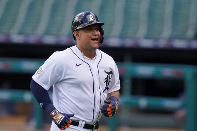 Detroit Tigers' Miguel Cabrera runs back to the dugout after the first inning of a baseball game against the Minnesota Twins, Sunday, Aug. 30, 2020, in Detroit. Cabrera's single was his 2,000th hit as a Tigers player. (AP Photo/Carlos Osorio)
