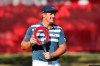 Bryson DeChambeau holds the Rocket Mortgage Classic golf tournament trophy Sunday, July 5, 2020, at Detroit Golf Club in Detroit. DeChambeau won the tournament by three strokes for his first victory of the season and sixth overall. (AP Photo/Carlos Osorio)