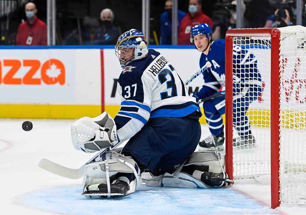 THE CANADIAN PRESS FILES/Nathan Denette
Reigning Vezina Trophy winner Connor Hellebuyck will start in net for the Winnipeg Jets against the Maple Leafs Thursday.