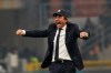 Inter Milan's head coach Antonio Conte celebrates after winning the Serie A soccer match between Inter Milan and AC Milan at the San Siro Stadium, in Milan, Italy, Sunday, Feb. 9, 2020. (AP Photo/Antonio Calanni)
