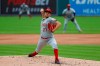 Cincinnati Reds pitcher Trevor Bauer throws to a Detroit Tigers batter during the first inning of the second baseball game of a doubleheader in Detroit, Sunday, Aug. 2, 2020. (AP Photo/Paul Sancya)