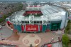 Manchester United's Old Trafford Stadium is seen after the collapse of English involvement in the proposed European Super League, Manchester, England, Wednesday, April 21, 2021. Manchester United executive vice-chairman Ed Woodward will step down from his role at the end of 2021 an announcement which came before Manchester United, along with the other five Premier League sides involved in the proposed European Super League (ESL), withdrew from the competition. (AP Photo/Jon Super)