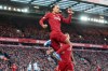Liverpool's Virgil van Dijk celebrates after scoring during the English Premier League soccer match between Liverpool and Brighton at Anfield Stadium, Liverpool, England, Saturday, Nov. 30, 2019. (AP Photo/Jon Super)