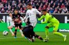 FILE --- In this Saturday, Nov. 23, 2019 photo Bayern's Thomas Mueller, center, Duesseldorf's goalkeeper Zack Steffen, right, Duesseldorf's Kasim Nuhu, bottom, and Duesseldorf's Matthias Zimmermann background, challenge for the ball during the German Bundesliga soccer match between Fortuna Duesseldorf and FC Bayern Munich in Duesseldorf, Germany. (AP Photo/Martin Meissner, file)