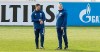 New head coach Dimitrios Grammozis, left, stands with assistant coach Mike Bueskens during his first training session of Bundesliga soccer club FC Schalke 04 in Gelsenkirchen, Germany, Wednesday, March 3, 2021. Grammozis is the 5th head coach this season, when the traditional club faces one of its biggest crises, as the club will most likely have to relegate to the 2nd division. (AP Photo/Martin Meissner)
