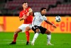 Germany's Serge Gnabry, right, and Switzerland's Granit Xhaka battle for the ball during the UEFA Nations League soccer match between Germany and Switzerland in Cologne, Germany, Tuesday, Oct. 13, 2020. (AP Photo/Martin Meissner)
