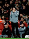 Arsenal's head coach Unai Emery reacts during the Europa League Group F soccer match between Arsenal and Eintracht Frankfurt at the Emirates Stadium, in London, Thursday, Nov. 28, 2019. (AP Photo/Matt Dunham)