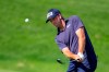 Michael Thompson chips on the 9th hole of the during the first round of the 3M Open golf tournament in Blaine, Minn., Thursday, July 23, 2020. (AP Photo/Andy Clayton- King)