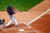 Minnesota Twins' Nelson Cruz hits a two run homer against the Kansas City Royals in the third inning of game one of a baseball double-header Saturday, Aug. 15, 2020, in Minneapolis. (AP Photo/Bruce Kluckhohn)