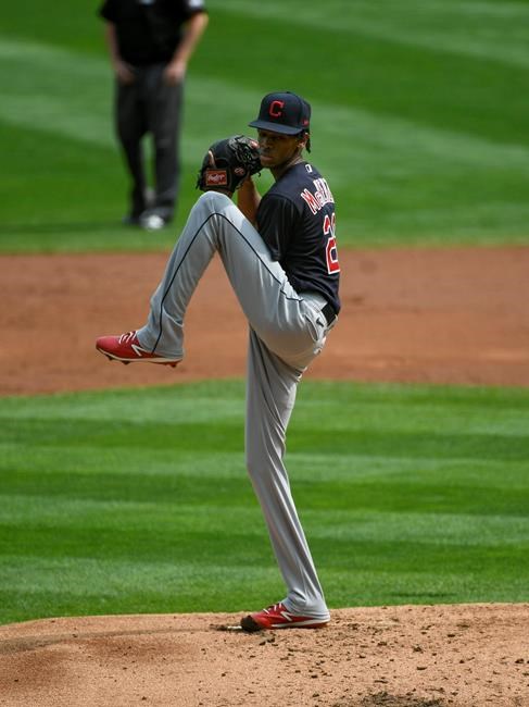 Cleveland Indians starting pitcher Triston McKenzie throws against the Minnesota Twins during the first inning of a baseball game Sunday, Sept. 13, 2020, in Minneapolis. (AP Photo/Craig Lassig)