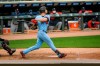 Minnesota Twins Max Kepler hits a single to center field to drive in the winning run during the ninth inning of a baseball game against the Boston Red Sox, Thursday, April 15, 2021, in Minneapolis. The Twins won 4-3. (AP Photo/Craig Lassig)