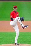 Minnesota Twins starting pitcher J.A. Happ (33) winds up to deliver to the Pittsburgh Pirates in the first inning of a baseball game Friday, April 23, 2021, in Minneapolis. (AP Photo/David Berding)