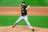 Pittsburgh Pirates starting pitcher JT Brubaker delivers to the Minnesota Twins in the first inning of a baseball game Friday, April 23, 2021, in Minneapolis. (AP Photo/David Berding)