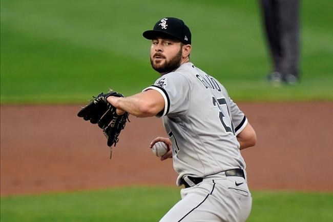 Chicago White Sox pitcher Lucas Giolito throws against the Minnesota Twins in the first inning of a baseball game Monday, Aug. 31, 2020, in Minneapolis. (AP Photo/Jim Mone)