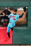 A fly ball goes off the glove of Minnesota Twins center fielder Byron Buxton on a triple by Cleveland Indians' Jordan Luplow in the sixth inning of a baseball game Saturday, Sept. 12, 2020, in Minneapolis. (AP Photo/Jim Mone)