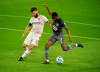 Minnesota United midfielder Kevin Molino (7) shoots the ball while defended by Real Salt Lake midfielder Kyle Beckerman (5) during the first half of an MLS soccer game, Sunday, Sept, 6, 2020 in St. Paul, Minn. (Jeff Wheeler/Star Tribune via AP)