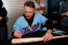 Minnesota Twins' Josh Donaldson autographs a bat at the baseball team's TwinsFest, Friday, Jan. 24, 2020, in Minneapolis. (AP Photo/Stacy Bengs)