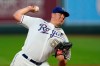 Kansas City Royals starting pitcher Brad Keller throws during the first inning of the team's baseball game against the Detroit Tigers on Friday, Sept. 25, 2020, in Kansas City, Mo. (AP Photo/Charlie Riedel)