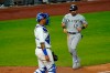 Chicago White Sox's Adam Eaton (12) runs home to score on a double by Jose Abreu during the sixth inning of the team's baseball game against the Kansas City Royals on Friday, May 7, 2021, in Kansas City, Mo. (AP Photo/Charlie Riedel)